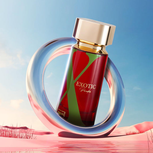 Rue Broca Exotic Paradise Red and gold perfume bottle with 'Exotic' branding on a blue sky background