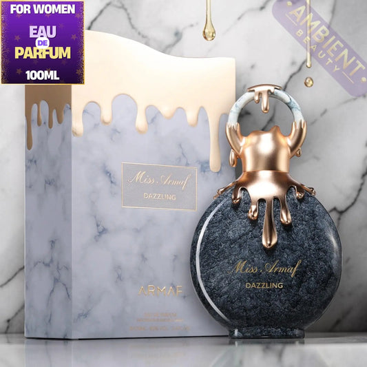 Miss Armaf Dazzling perfume bottle with packaging on a marble background