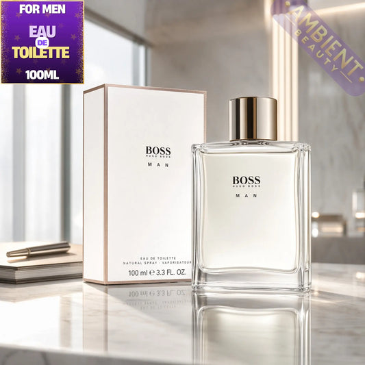 BOSS men's perfume bottle and packaging on a reflective surface with 'Ambient Beauty' branding.