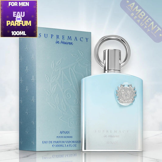 Supremacy in Heaven perfume bottle and packaging on a light blue background