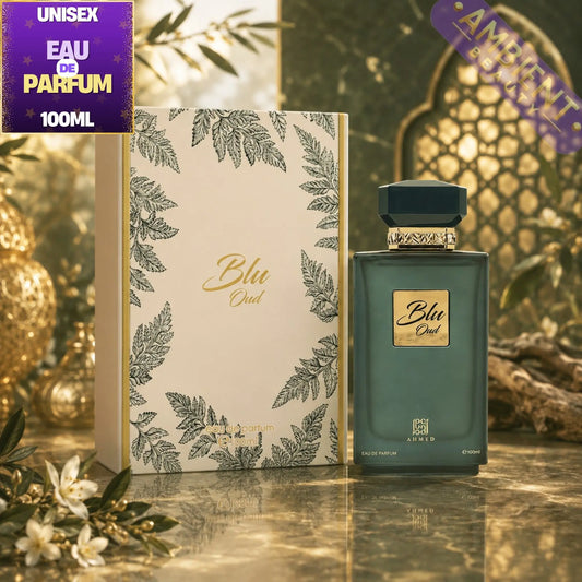 Blu Oud perfume bottle and packaging with decorative elements on a reflective surface.