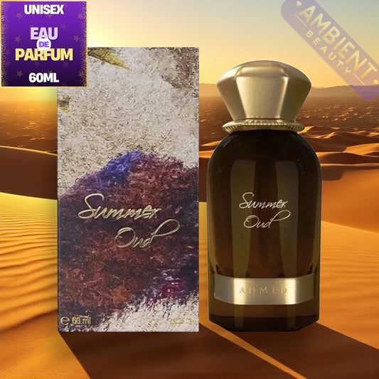 Ahmed Al Maghribi Summer Oud Perfume bottle and packaging of 'Summer Oud' with 'Ambient Beauty' watermark on a desert background.