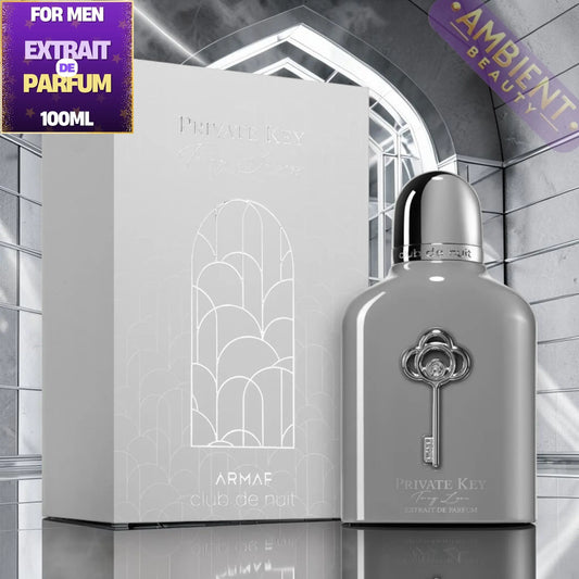 Perfume bottle and packaging with 'Private Key To My Success' design on a reflective surface.
