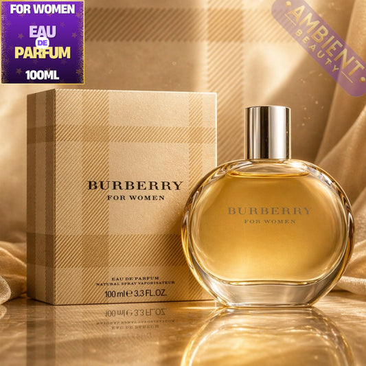 Burberry perfume bottle and packaging on a reflective surface with 'Ambient Beauty' label.