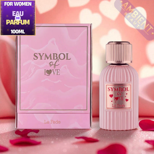 Perfume bottle and packaging of 'Symbol of Love' by La Fede on a pink background with hearts.