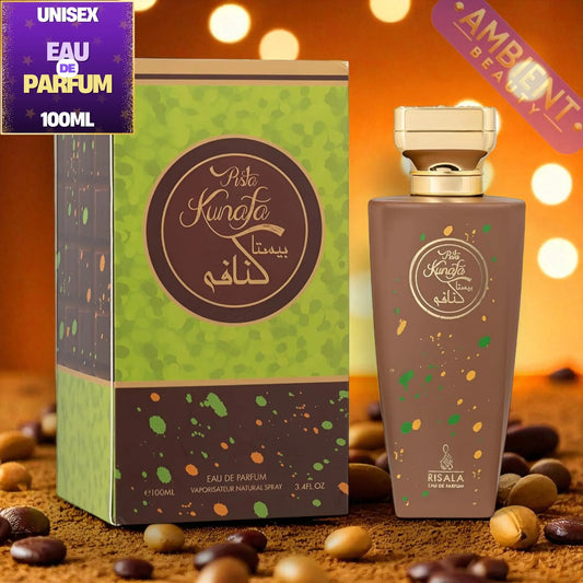 Perfume bottle and packaging with 'Pista Kunafa' branding on a warm-toned background.