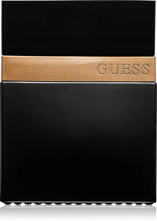 Black Guess perfume bottle with gold cap on a white background