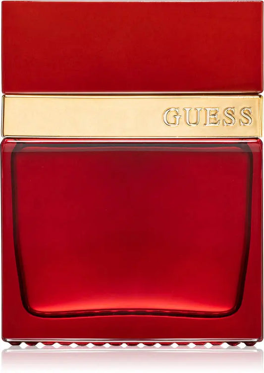 Red Guess perfume bottle with gold cap on a white background