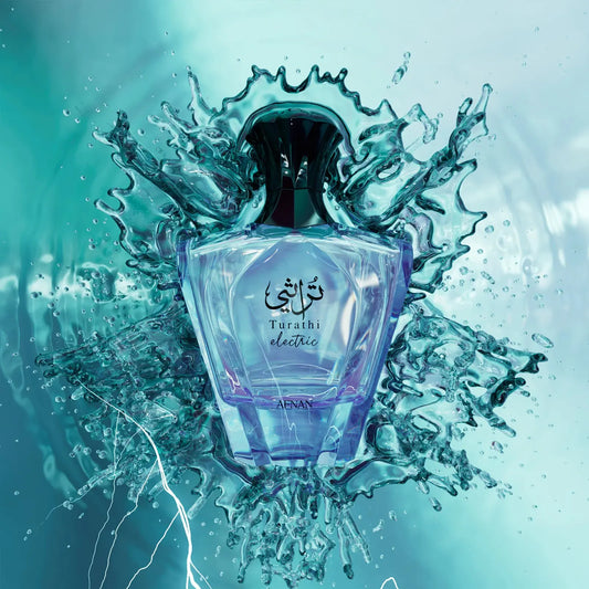 Afnan Turathi Electric Perfume bottle with water splashes on a blue background