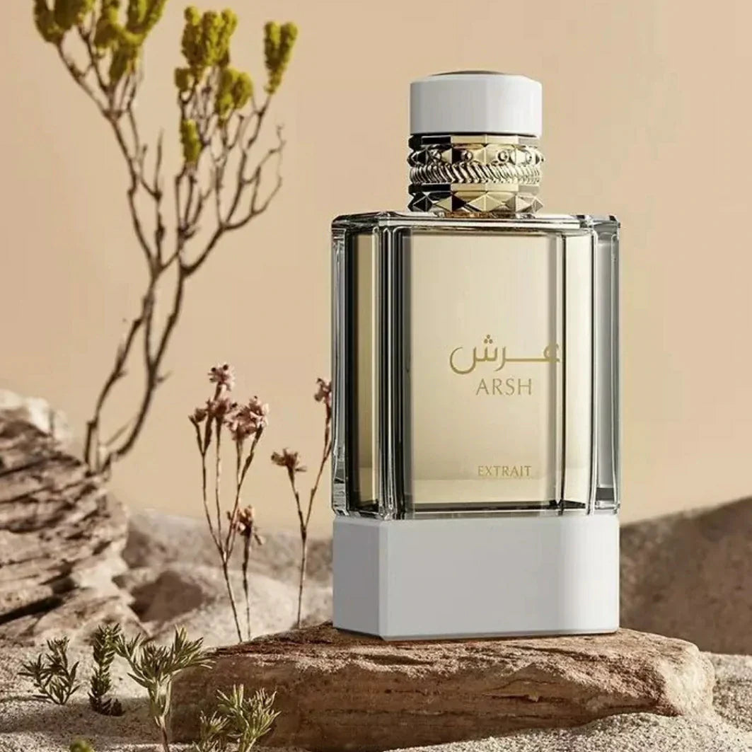 French Avenue Arshperfume bottle on a rock with desert landscape