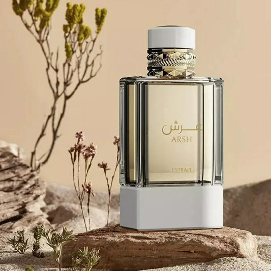 French Avenue Arshperfume bottle on a rock with desert landscape