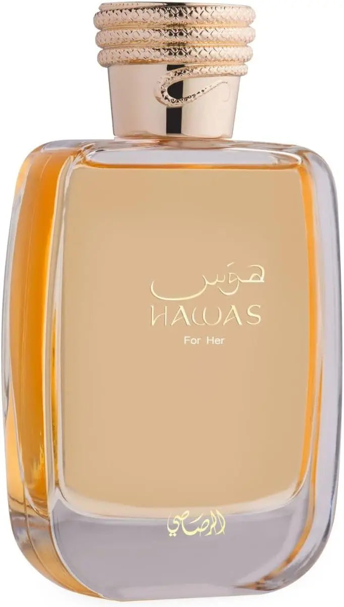 Perfume bottle with gold cap and clear body on a white background