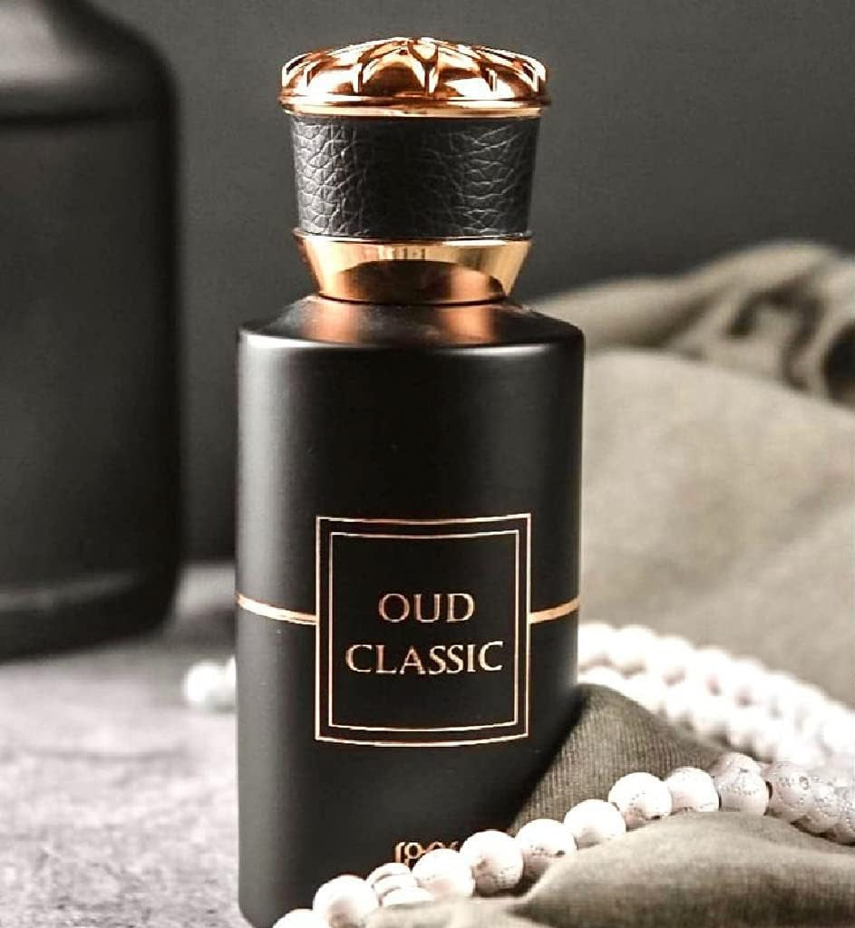 Ahmed Al Maghribi Oud Classic Perfume bottle labeled 'Oud Classic' with a gold cap on a textured surface.