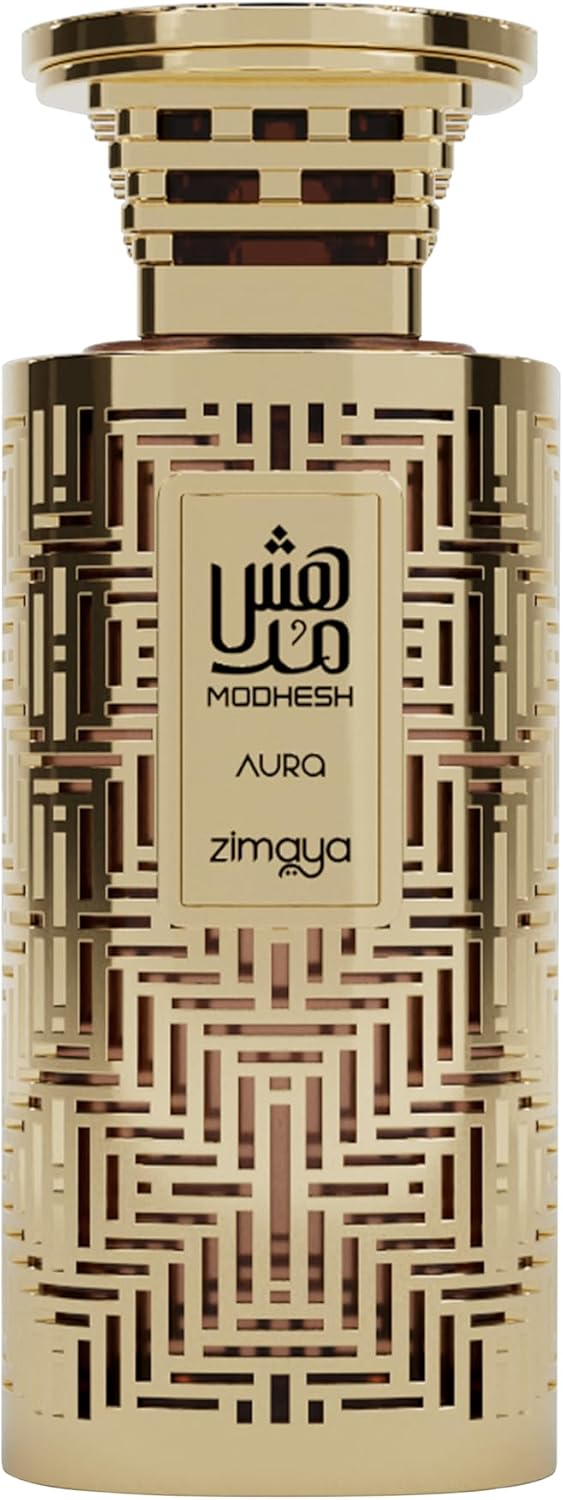 Modhesh Aura Zimaya Gold perfume bottle with intricate patterns and 'Modhesh Aura' branding on a beige background