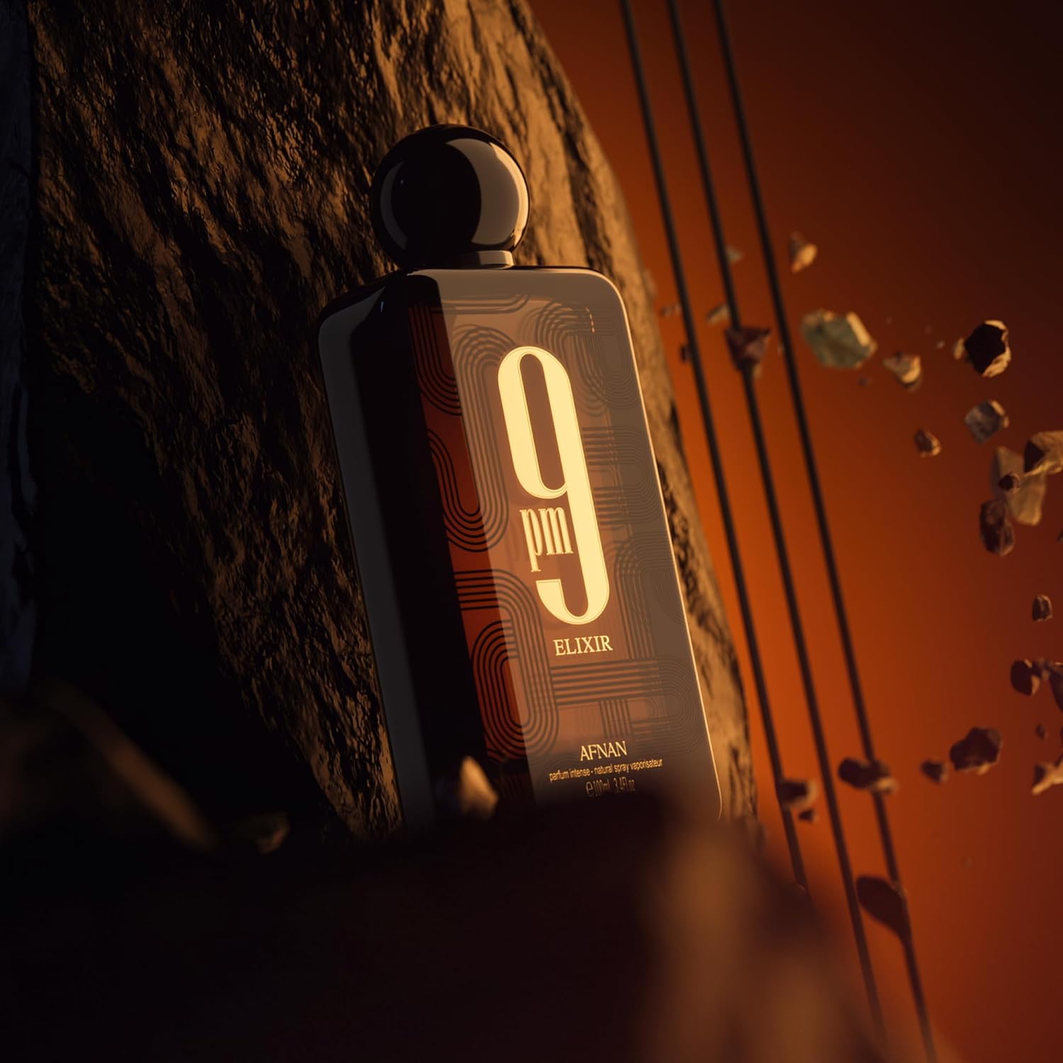 Perfume bottle labeled '9pm Elixir' by Afnan against a textured background