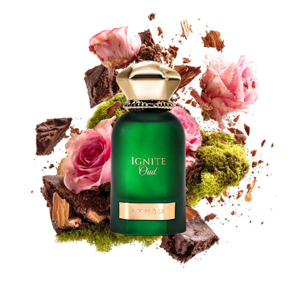 Ahmed Al Maghribi Ignite oud Green perfume bottle with gold cap on a decorative background with flowers and brownies