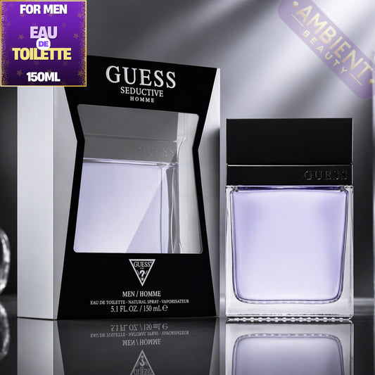 Guess Seductive Homme perfume bottle and packaging on a reflective surface
