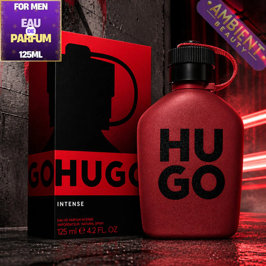 Red Hugo Boss perfume bottle and packaging on a dark background