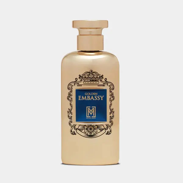 Gold perfume bottle labeled 'Golden Embassy' on a light gray background