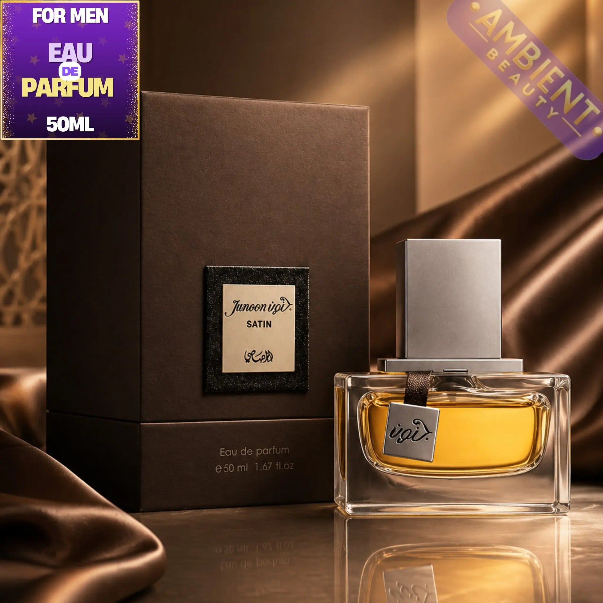 Rasasi Junoon Satin Eau de Parfum bottle with packaging on a reflective surface, with 'Ambient Beauty' branding.