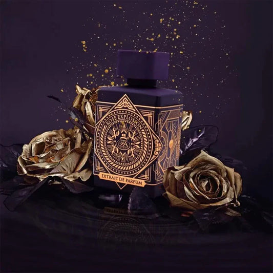 Decorative perfume bottle with gold accents and dried roses on a dark background