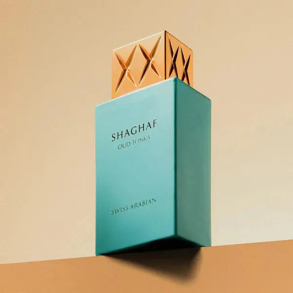 Shaghaf perfume bottle with gold cap on a beige background