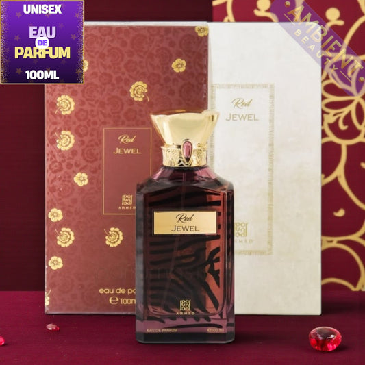 Ahmed Al Maghribi Red Jewel Perfume bottle with gold cap and 'Red Jewel' packaging on a red background