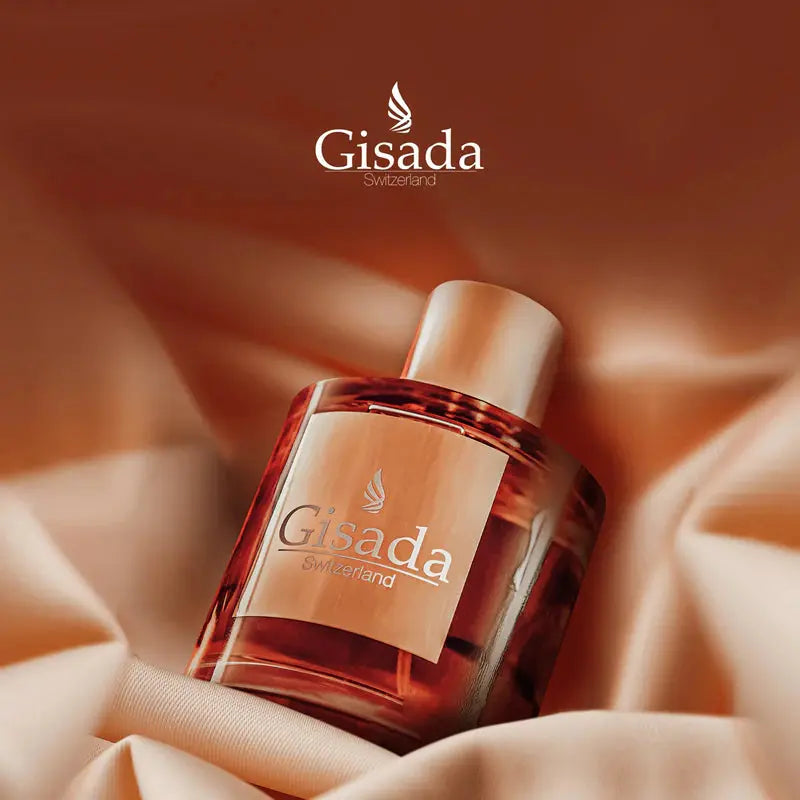 Gisada perfume bottle on a soft fabric background