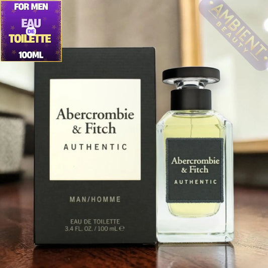 Abercrombie & Fitch Authentic Eau de Toilette bottle and packaging on a wooden surface.
