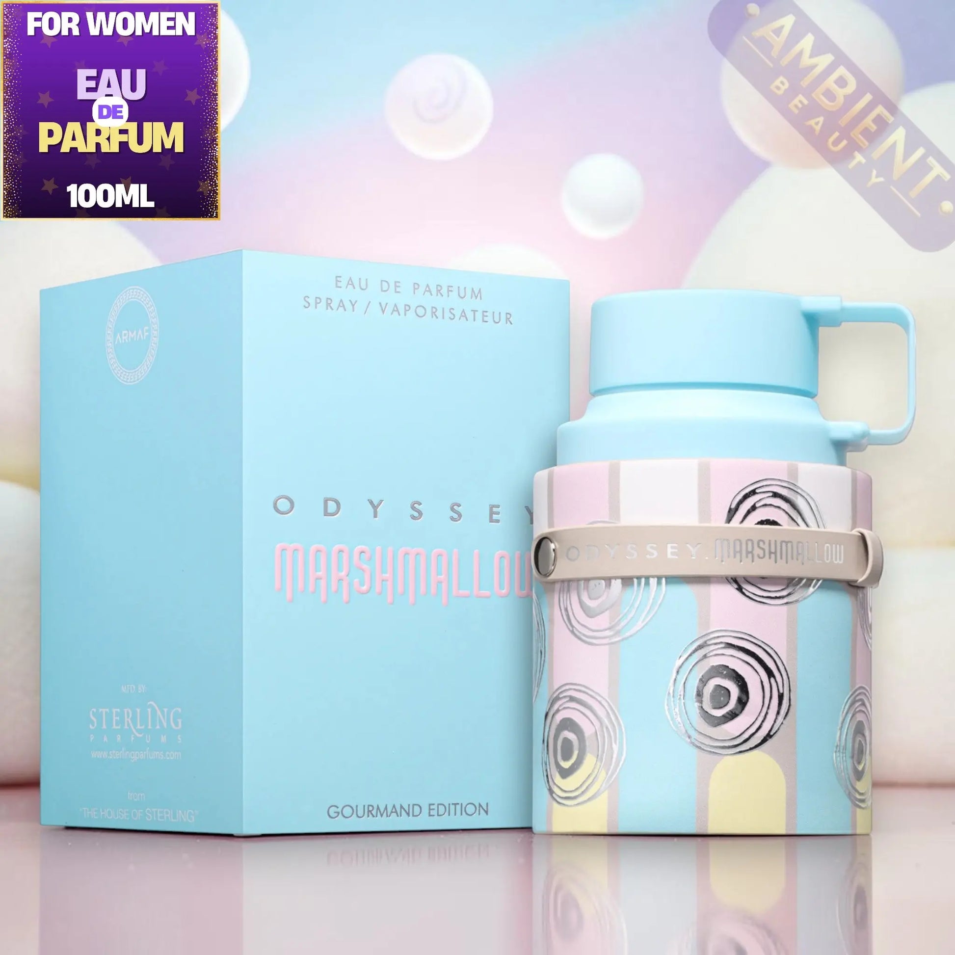 Odyssey Marshmallow perfume bottle and packaging on a colorful background