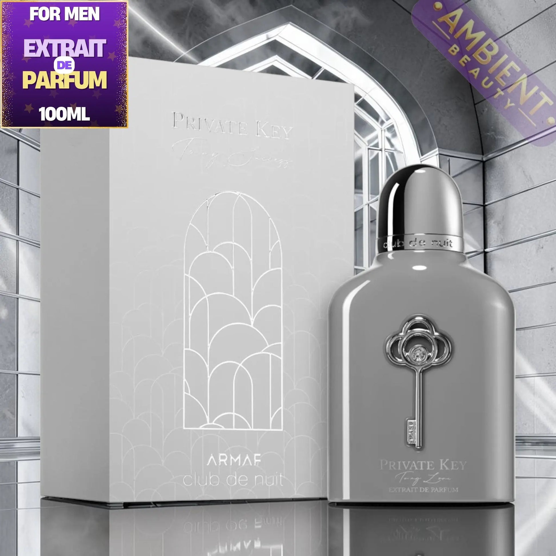 Perfume bottle and packaging with 'Private Key To My Success' design on a reflective surface.