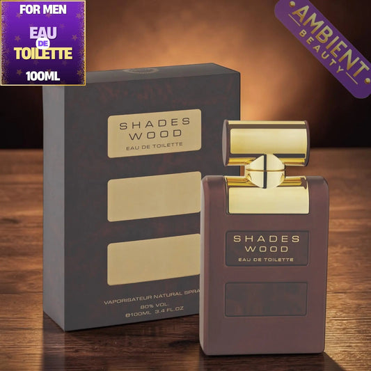 Shades Wood perfume bottle and packaging on a wooden surface with Ambient Beauty branding.