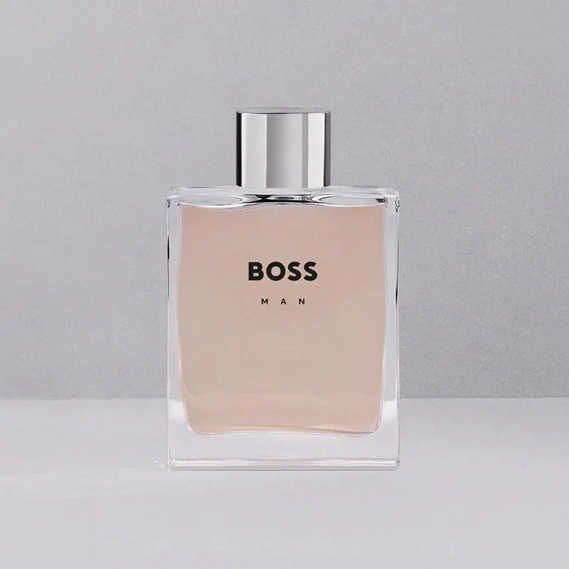 BOSS Man perfume bottle on a gray background