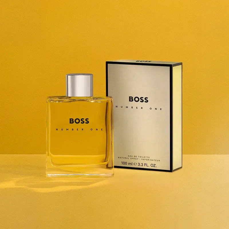 BOSS Number One perfume bottle and packaging on a yellow background