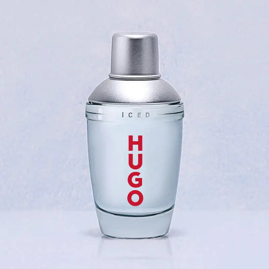 Hugo Boss perfume bottle with silver cap and red text on a light gray background