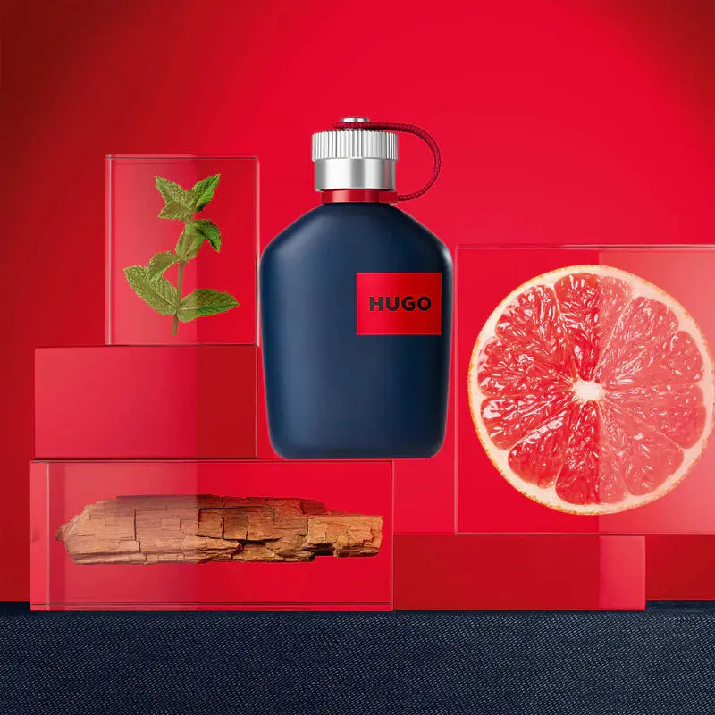 Hugo Boss perfume bottle with red background