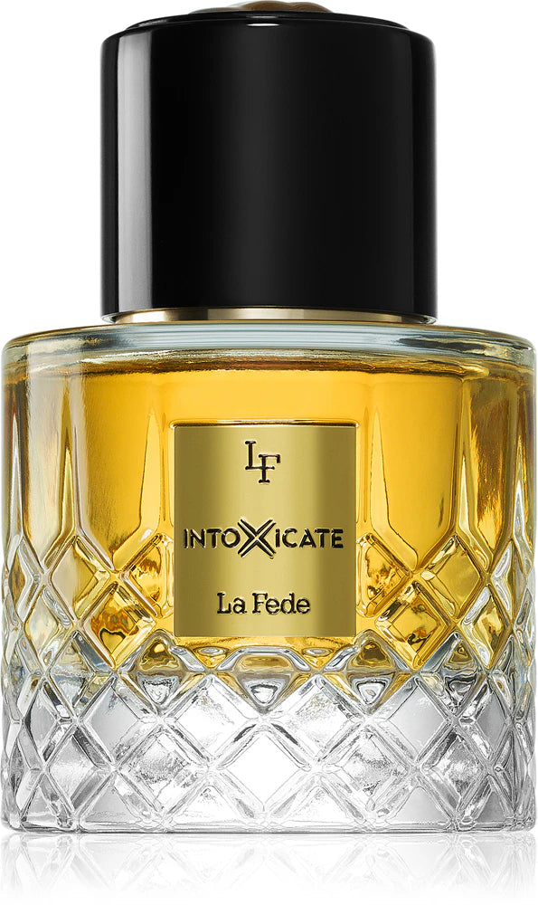 Perfume bottle labeled 'Intoxicate La Fede' with a black cap on a white background