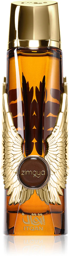 Perfume bottle of Zimaya Itqan Gold with wings design on a reflective surface