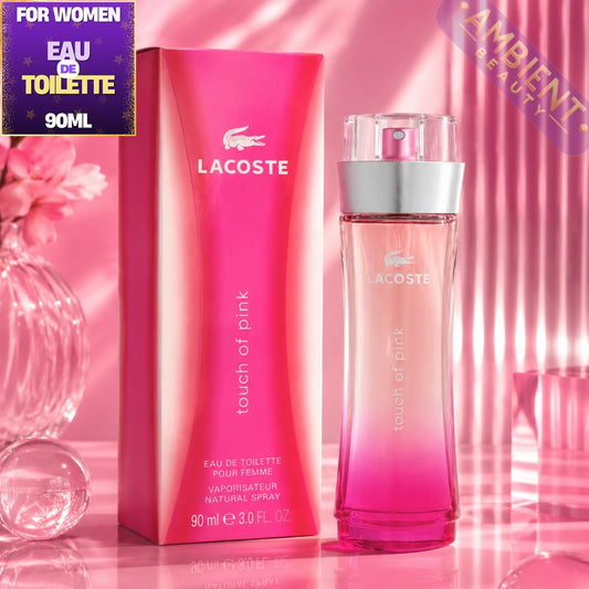 Lacoste women's perfume bottle and packaging on a pink background