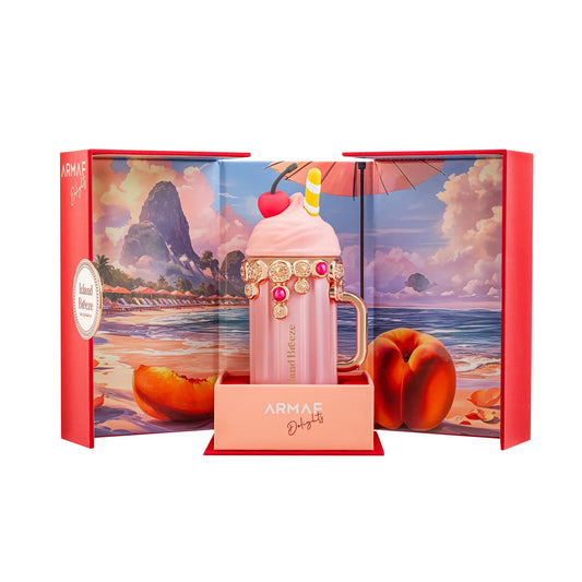 Pink dessert-themed perfume bottle with peach and cherry elements in a decorative box.
