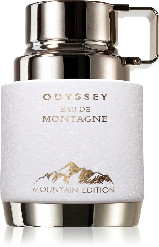 Odyssey Eau de MontagneMountain Edition perfume bottle with mountain design on a white background