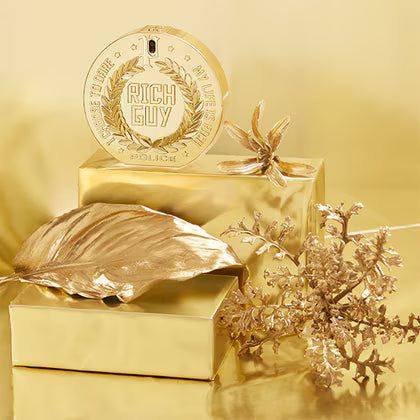 Gold 'Rich Guy' Police product with decorative elements on a gold background