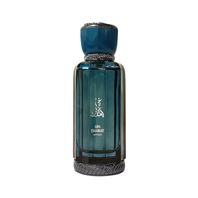 Blue perfume bottle with decorative cap on a white background