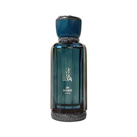 Blue perfume bottle with decorative cap on a white background