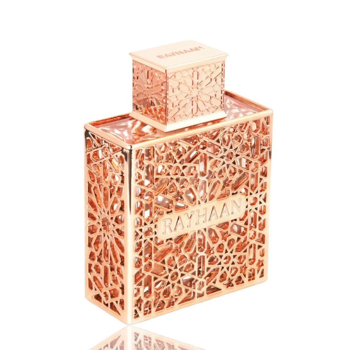 Rayhaan Divine Rose gold decorative bottle with intricate patterns on a white background