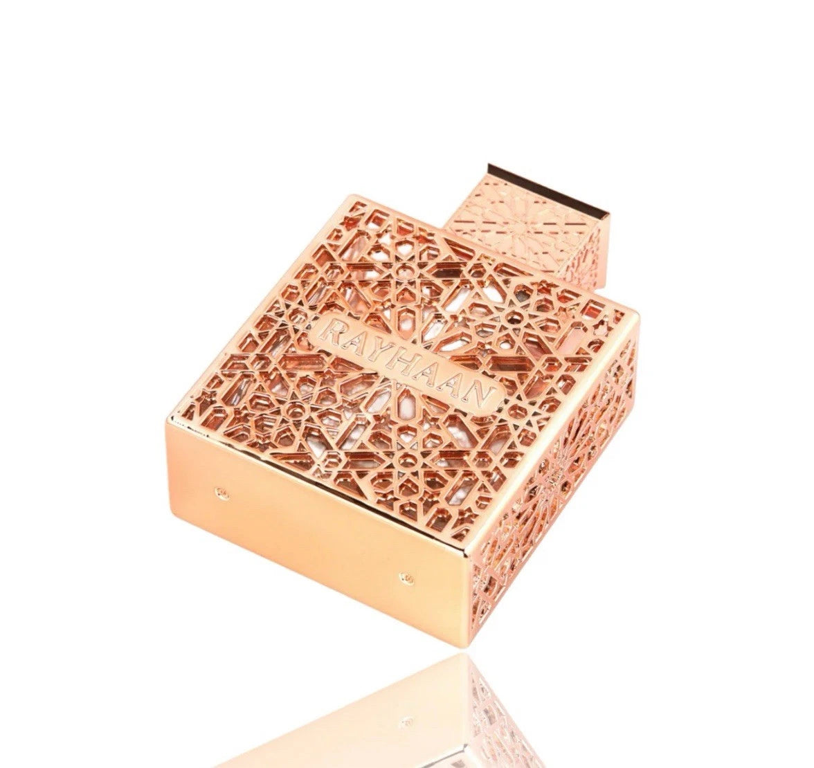 Rayhaan Divine Rose gold decorative box with intricate patterns on a white background