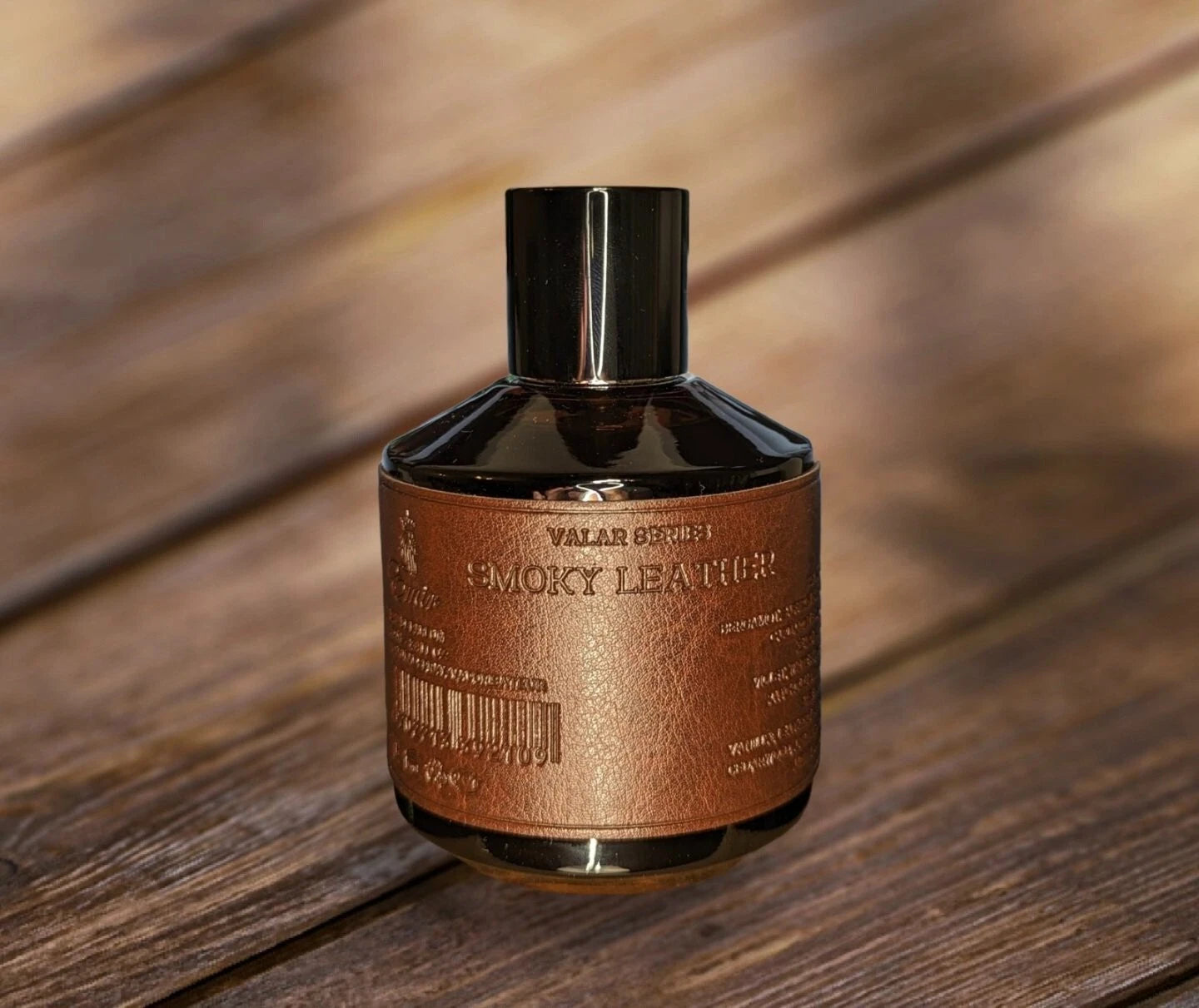 Bottle of Emir Smoky leather on a wooden surface