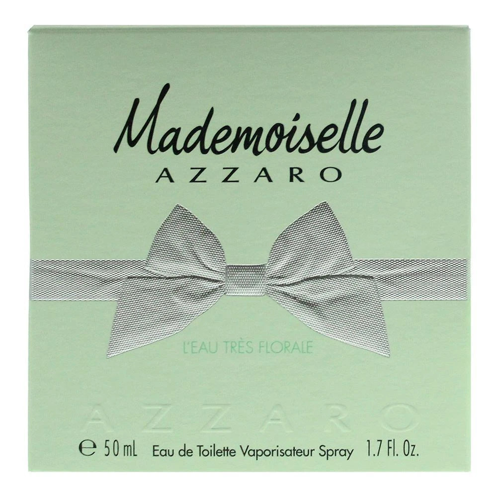 Azzaro Mademoiselle perfume packaging with a green background and bow design.