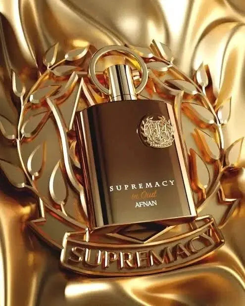 Perfume bottle labeled 'Supremacy' by Afnan on a gold background