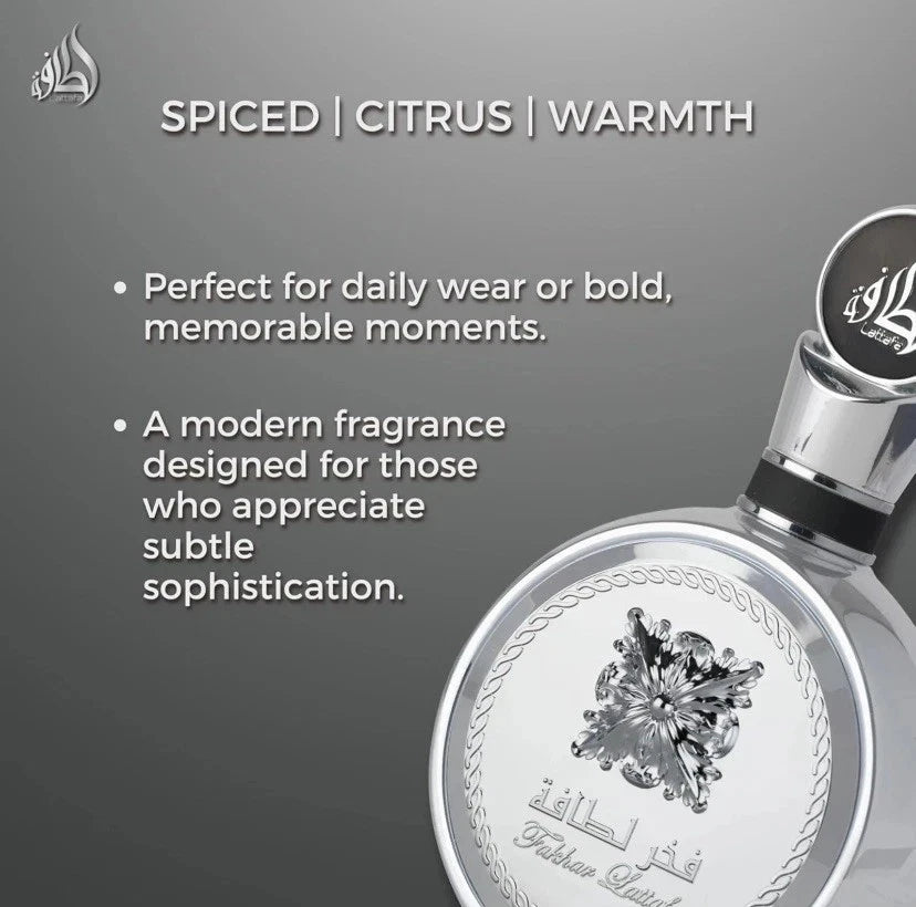 Lattafa Fakhar Platin Silver perfume bottle with text on a gray background